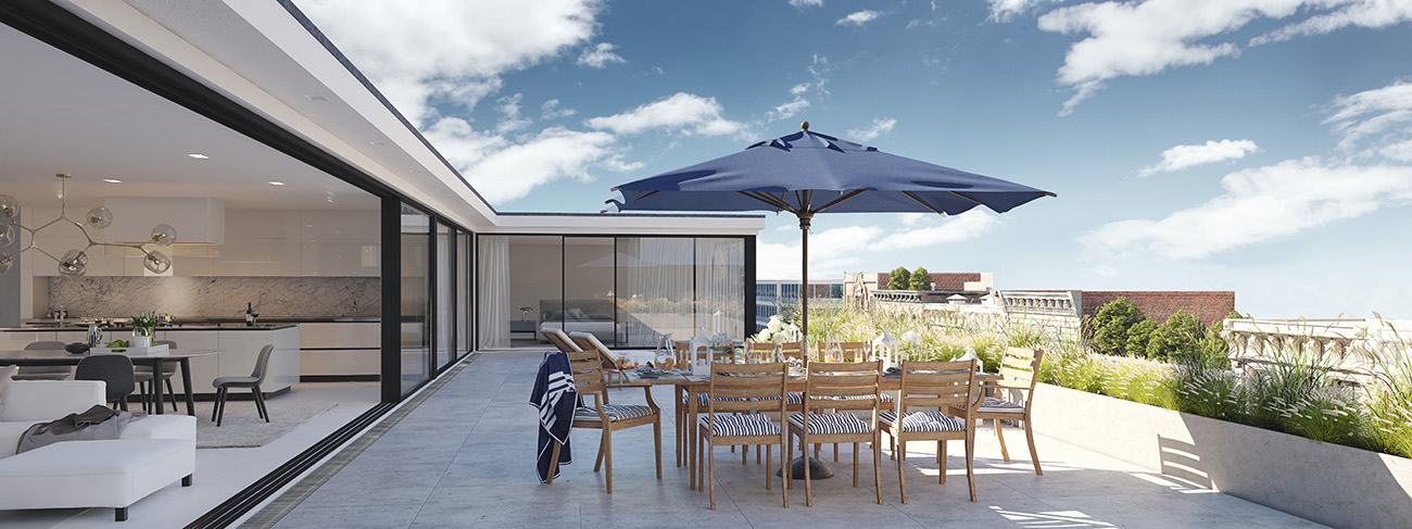 Dakterras met afvoerkanaal en eettafel